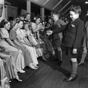 Getting partners at Balloon Dancing at Children Camp, near Hindhead, Surrey. May 1941 Getting partners at Balloon Dancing at Children Camp, near Hindhead, Surrey. May 1941