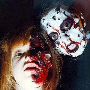 Ghouls Lauren Thompson and Tristan Laidlaw practice for Halloween decked in make-up in