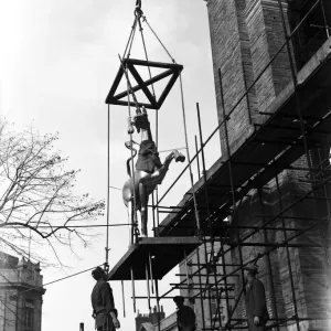 One of the gilded unicorns seen here being hoisted up on to the roof of Bristol City Hall One of the gilded unicorns seen here being hoisted up on to the roof of Bristol City Hall