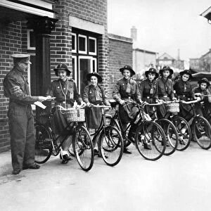 Girl Guides receive notes to be delivered to members of the Home Guard 22nd October 1940