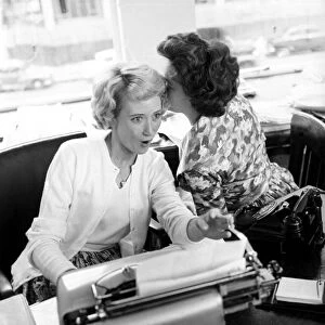 Girls gossiping in the office, September 1960 Secretary typist office worker