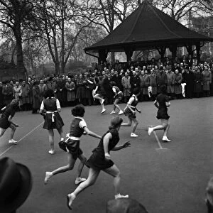Girls playing netball In Lincolns Inn Fields. November 1952 C5606