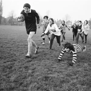 Girls versus boys rugby match between students of North West London Polytechnic Girls versus boys rugby match between students of North West London Polytechnic