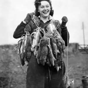 Print of Women in S.Wales as ratcatchers, March 1944