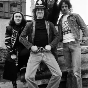 Glam rock group Slade posing for pictures in Birmingham City Centre. 25th March 1977 Glam rock group Slade posing for pictures in Birmingham City Centre. 25th March 1977