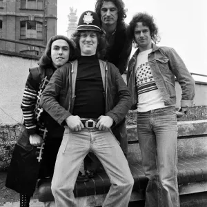 Glam rock group Slade posing for pictures in Birmingham City Centre. 25th March 1977 Glam rock group Slade posing for pictures in Birmingham City Centre. 25th March 1977