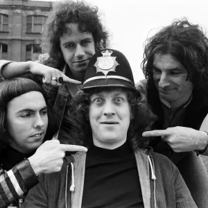 Glam rock group Slade posing for pictures in Birmingham City Centre. 25th March 1977 Glam rock group Slade posing for pictures in Birmingham City Centre. 25th March 1977