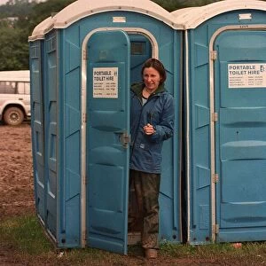 Glastonbury Festival 1997 with Mirror reporter Lucy Rock coming out of a portaloo