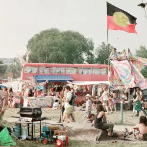 Glastonbury Festival, Worthy Farm, Picton, Somerset. A London Bus decorated Glastonbury Festival, Worthy Farm, Picton, Somerset. A London Bus decorated