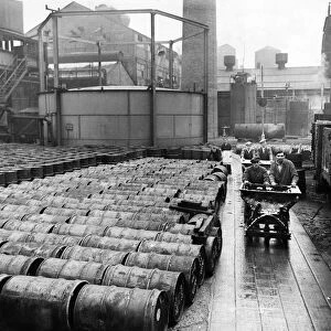 A glimpse of the vast Gaskell-Marsh works at Widnes. The men are conveying loads of