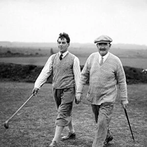 Golfers Sandy Herd and A. J. Lacey seen here competing in a £