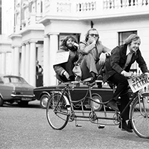 The Goodies, on the perfect answer to petrol rationing, ride their three seater tandem