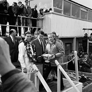 Goodwood International Race Meeting, Easter Monday. Jim Clark with the Sunday Mirror