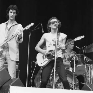 Graham Parker and The Rumour seen here performing on stage at The Picnic pop concert Graham Parker and The Rumour seen here performing on stage at The Picnic pop concert