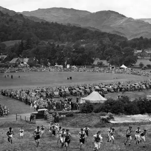 Grasmere Sportsand Show 1951. The Juvenile Guides race, the runners have just left Grasmere Sportsand Show 1951. The Juvenile Guides race, the runners have just left