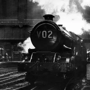 The Great Western Railway 6000 Class King George VI 4-6-0 steam locomotive 6028 pulls The Great Western Railway 6000 Class King George VI 4-6-0 steam locomotive 6028 pulls