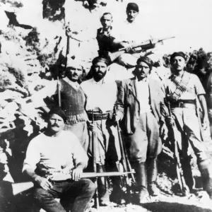 Greek guerialla fighters in the mountains of Crete wearing the traditional headdress