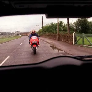 Green Vauxhall Astra van July 1999 with red Honda motorbike Green Vauxhall Astra van July 1999 with red Honda motorbike