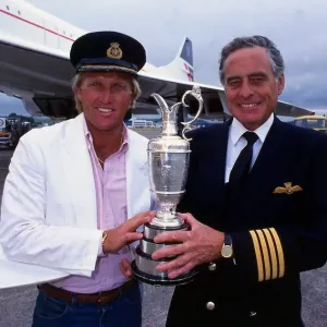 Greg Norman holds the Claret Jug trophy after winning the British Open with Concorde Greg Norman holds the Claret Jug trophy after winning the British Open with Concorde