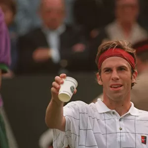 GREG RUSEDSKI TAKES A BREAK DURING HIS GAME WITH PETE SAMPRAS AT THE 1995
