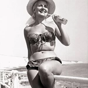 Greta Miller singer from Glasgow on the beach at Brighton wearing a bikini