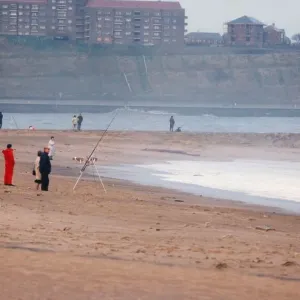 A group of anglers enjoying a spot of fishing on the beach at South Shields