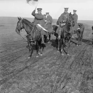 A group of Canadians signalling to the front lines on the Western Front. Circa 1915