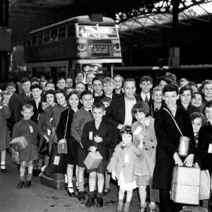 Group of children at a London Station ready to leave for the safety of the countryside Group of children at a London Station ready to leave for the safety of the countryside