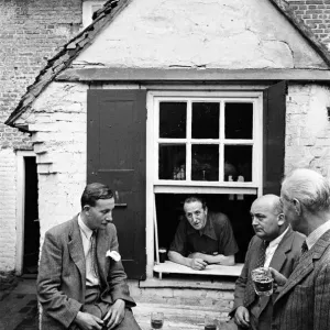 A group of men enjoy a game of Bat and Trap at a pub in Kent A group of men enjoy a game of Bat and Trap at a pub in Kent
