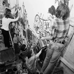 Group mural being painted on wall at Stockton YMCA, Bath Lane, Stockton, 1971