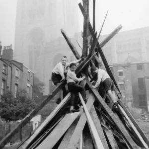 A group of schoolboys seen here adding the final touches to their bonfire in the shadow A group of schoolboys seen here adding the final touches to their bonfire in the shadow