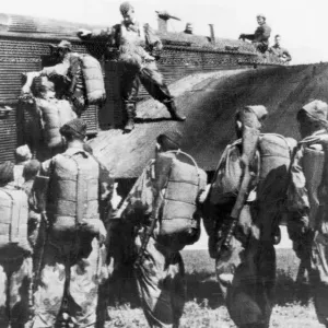 A group of Soviet parachutists boarding a plane during drills before joining guerillas