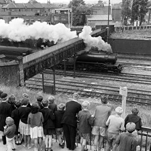Another group of spotters in July 1960 gather at Finsbury Park on the East Coast Mainline