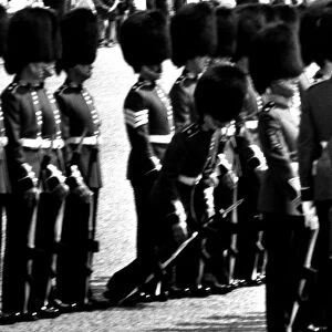 A guardsman faints whilst on parade during the Trooping of the Colour 1969