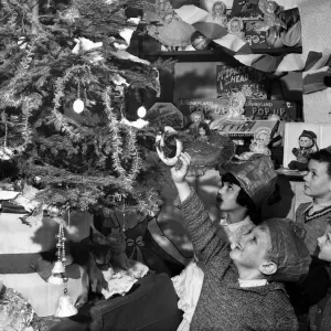 Guest at a Christmas party given by Liverpool Child Welfare Association at their Copperas Guest at a Christmas party given by Liverpool Child Welfare Association at their Copperas