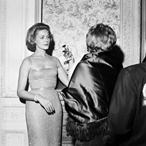 Guests attending a party held by Laurence Olivier and Lauren Bacall. 10th November 1958