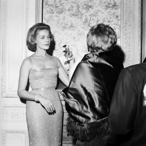 Guests attending a party held by Laurence Olivier and Lauren Bacall. 10th November 1958