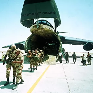 Gulf War US Troops disembark from a USAF Galaxy transport aircraft