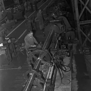 Gun barrels for tanks under construction at the Royal Ordnance Factory, Llanishen Gun barrels for tanks under construction at the Royal Ordnance Factory, Llanishen