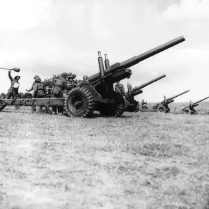Gunners of a medium regiment of the Royal Artillery practice with 5. 5