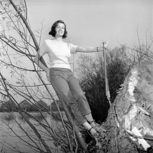 Gwendolen Tulley poses with her rifle as she enjoys a shooting holiday, 1956 Gwendolen Tulley poses with her rifle as she enjoys a shooting holiday, 1956