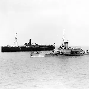 H. M. S. "Cockchafer"dropping anchor at point where she picks up convoy