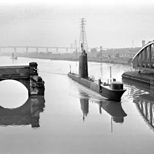 H. M.s Onyx leading H. M.s Olympus through the Barton Bridge area of the Manchester Ship