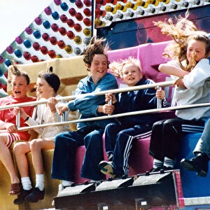 A hair raising experience for youngsters on one of the rides at the Clairville Common