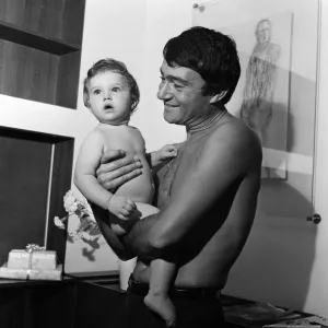 Vidal Sassoon with one-year-old daughter Catya, 1969 Print Vidal Sassoon with one-year-old daughter Catya, 1969 Print
