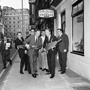 Bill Haley and bandleader Chris Barber are pictured with The Comets outside the Tin Pan