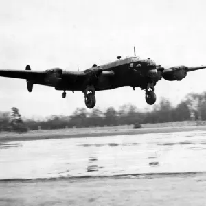 A Halifax bomber landing after a night raid over Italy during the second World War