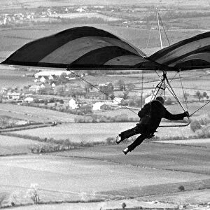 A hang glider flying over the Cleveland countryside in March 1975