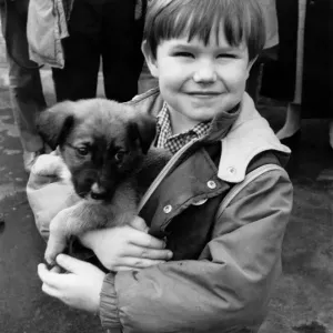 Happy... Ben with his new pup Bill. December 1986 P006093 Happy... Ben with his new pup Bill. December 1986 P006093