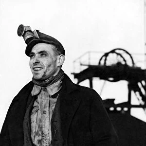A happy miner at his pit December 1947 P017731
